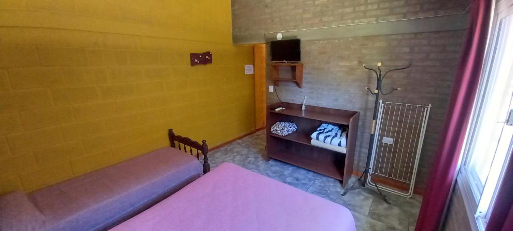 Postel nebo postele na pokoji v ubytování Santa isabel
