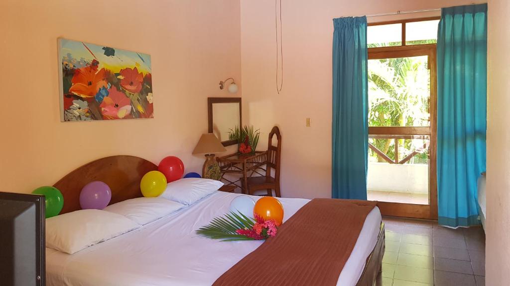 Postel nebo postele na pokoji v ubytování Samara Beach Hotel