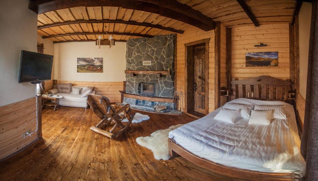 Postel nebo postele na pokoji v ubytování Apart-hotel Vershina