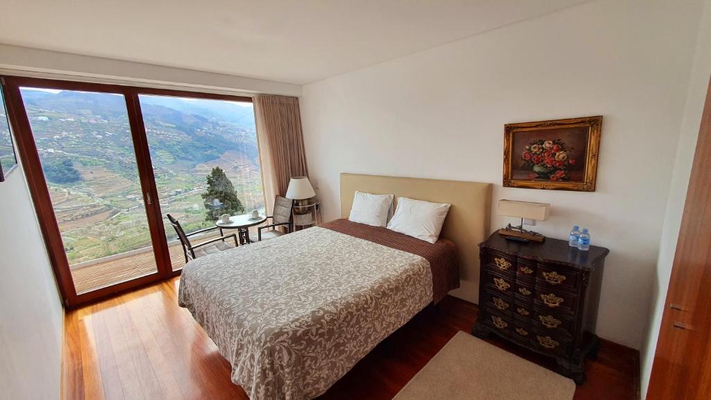 Postel nebo postele na pokoji v ubytování Imaginário D'El Rei - Guest House