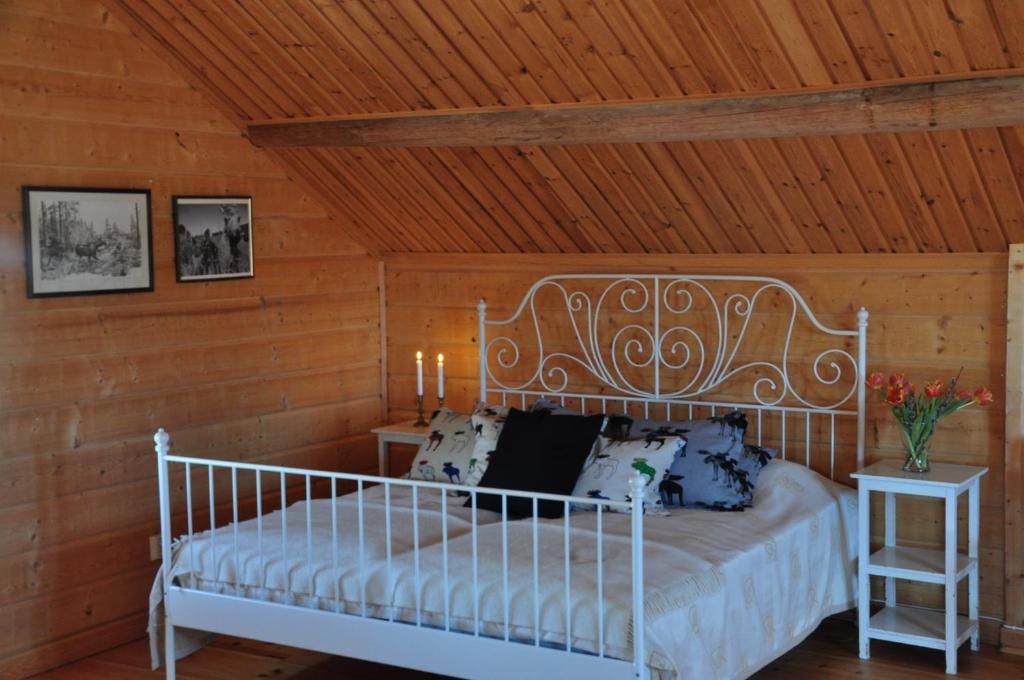 Säng eller sängar i ett rum på Moose Garden