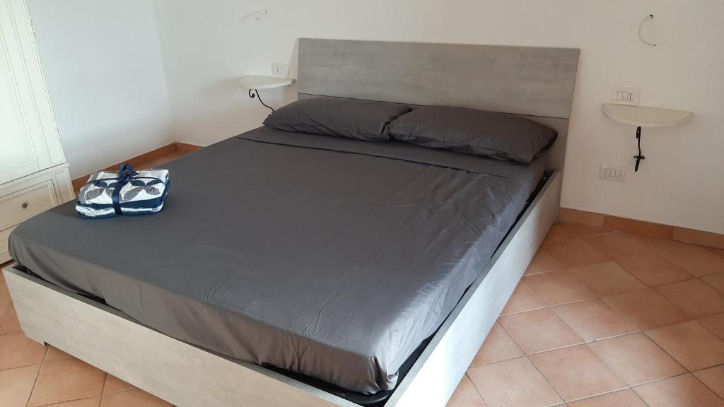 Postel nebo postele na pokoji v ubytování Appartamento Residence Mirice Vignola mare Aglientu casa Mattia