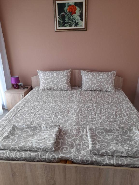 Llit o llits en una habitació de Apartman Bojan