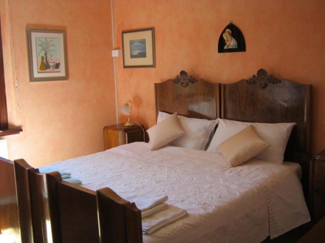 Postel nebo postele na pokoji v ubytování D'Orsaria B&B And Wines