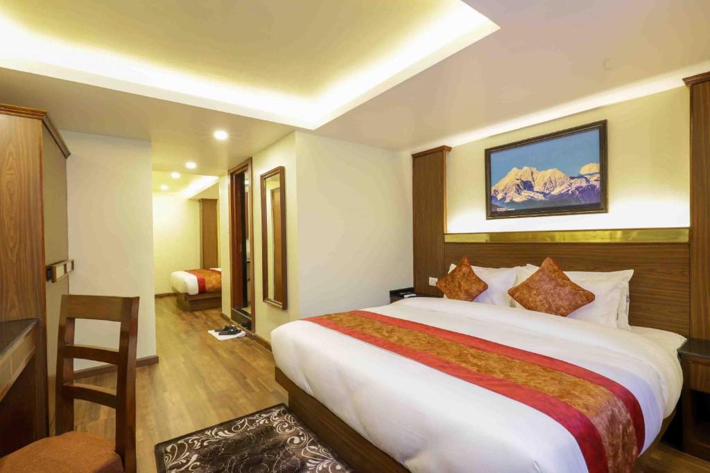 Postel nebo postele na pokoji v ubytování Thamel Boutique Hotel