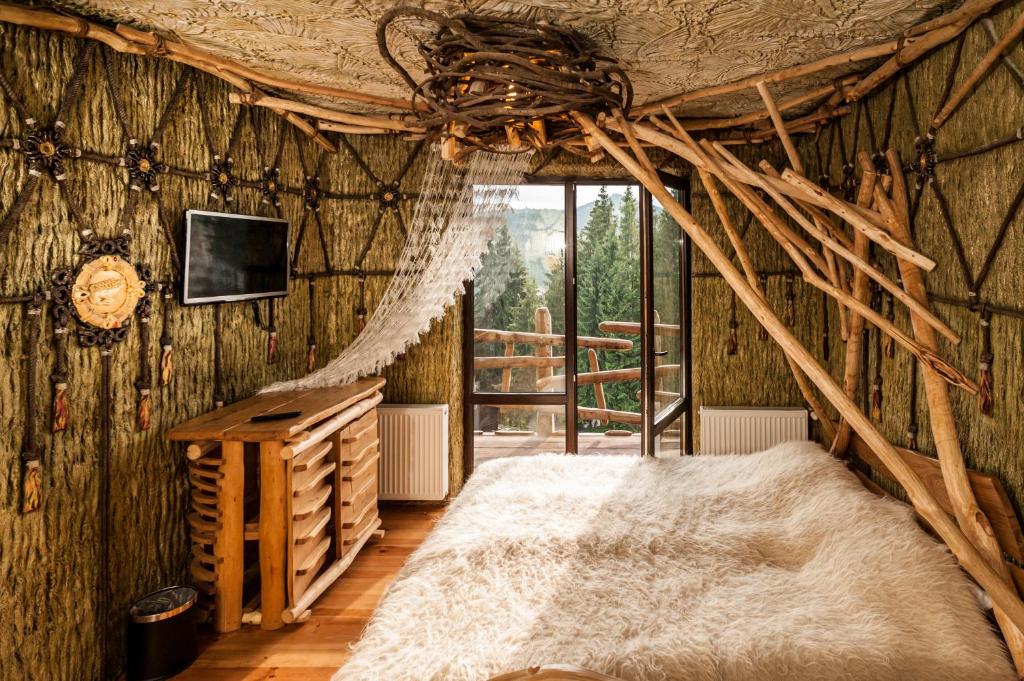 Postel nebo postele na pokoji v ubytování Stara Pravda Hotel - History