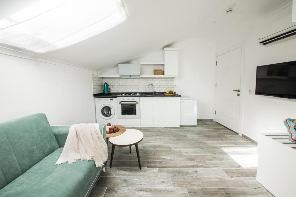 A kitchen or kitchenette at Cedrus Suites