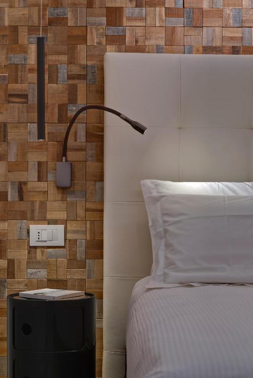 Postel nebo postele na pokoji v ubytování Hotel Terme Formentin