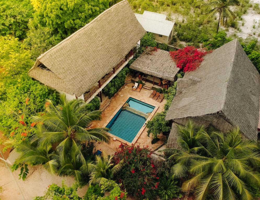 an overhead view of a house with a swimming pool at Tamani Villas - Annex in Matemwe