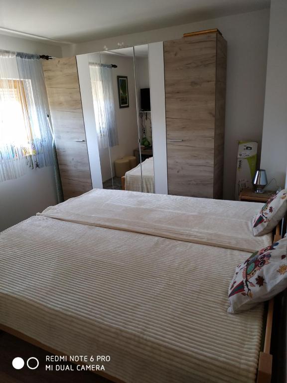 Postel nebo postele na pokoji v ubytování Seosko turističko domaćinstvo MILKA