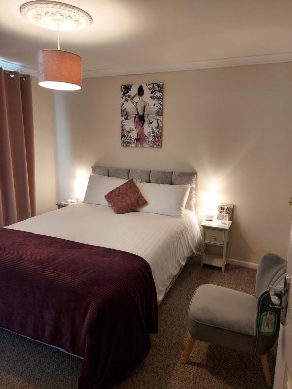 Postel nebo postele na pokoji v ubytování LegenDerry B&B