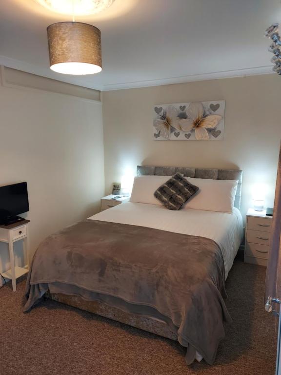 Postel nebo postele na pokoji v ubytování LegenDerry B&B