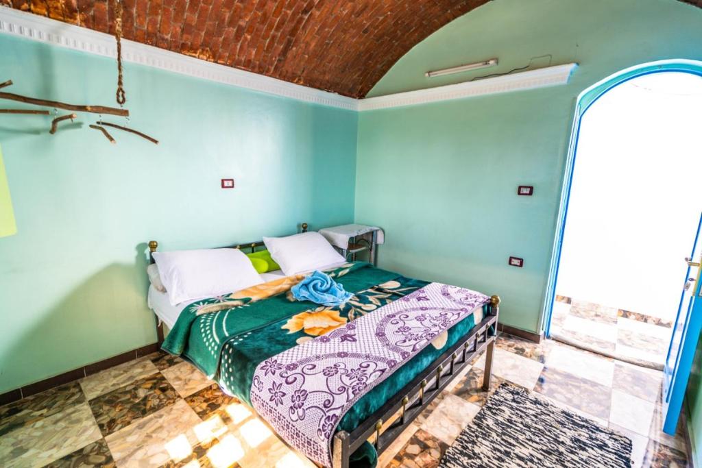 Postel nebo postele na pokoji v ubytování Nubian Paradise