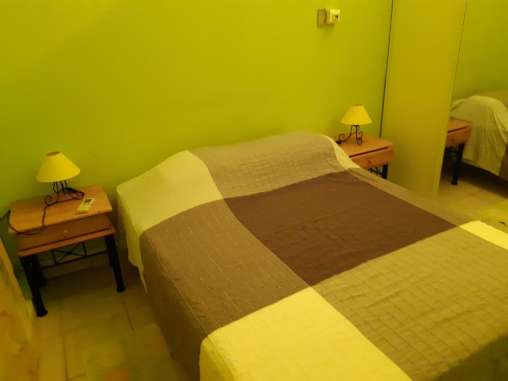 Postel nebo postele na pokoji v ubytování Les Gites Josiane