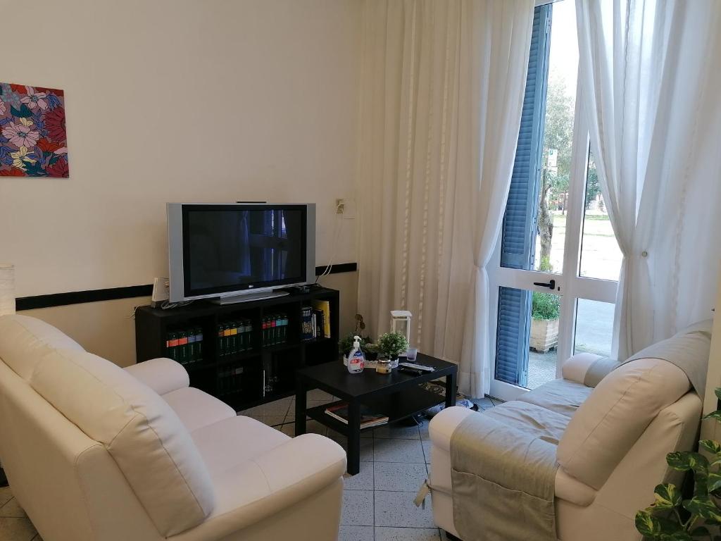 TV a/nebo společenská místnost v ubytování Hotel Cilene