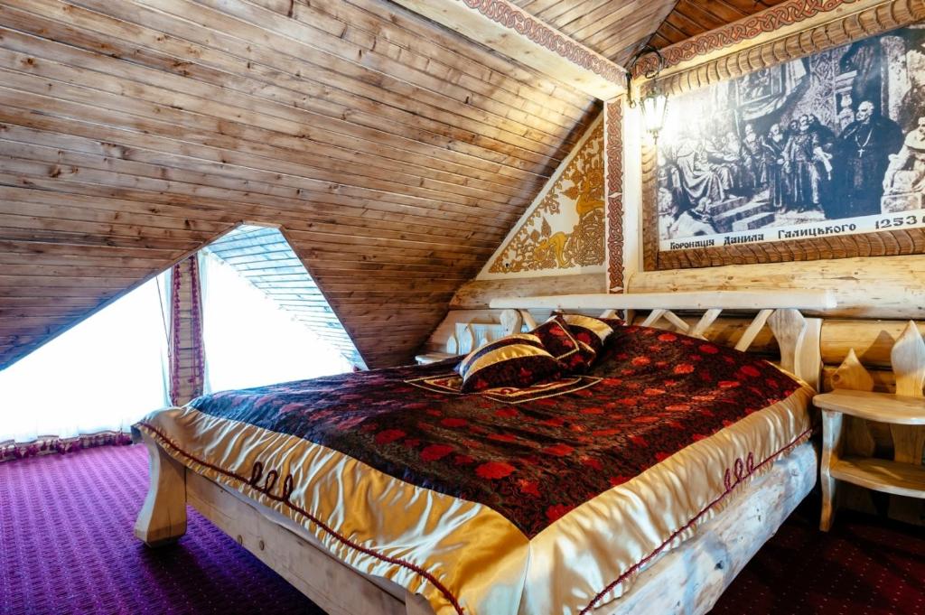 Postel nebo postele na pokoji v ubytování Stara Pravda Hotel - History
