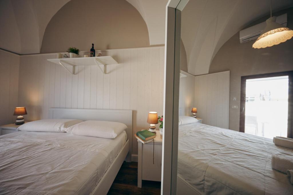 Postel nebo postele na pokoji v ubytování Le Terrazze B&B