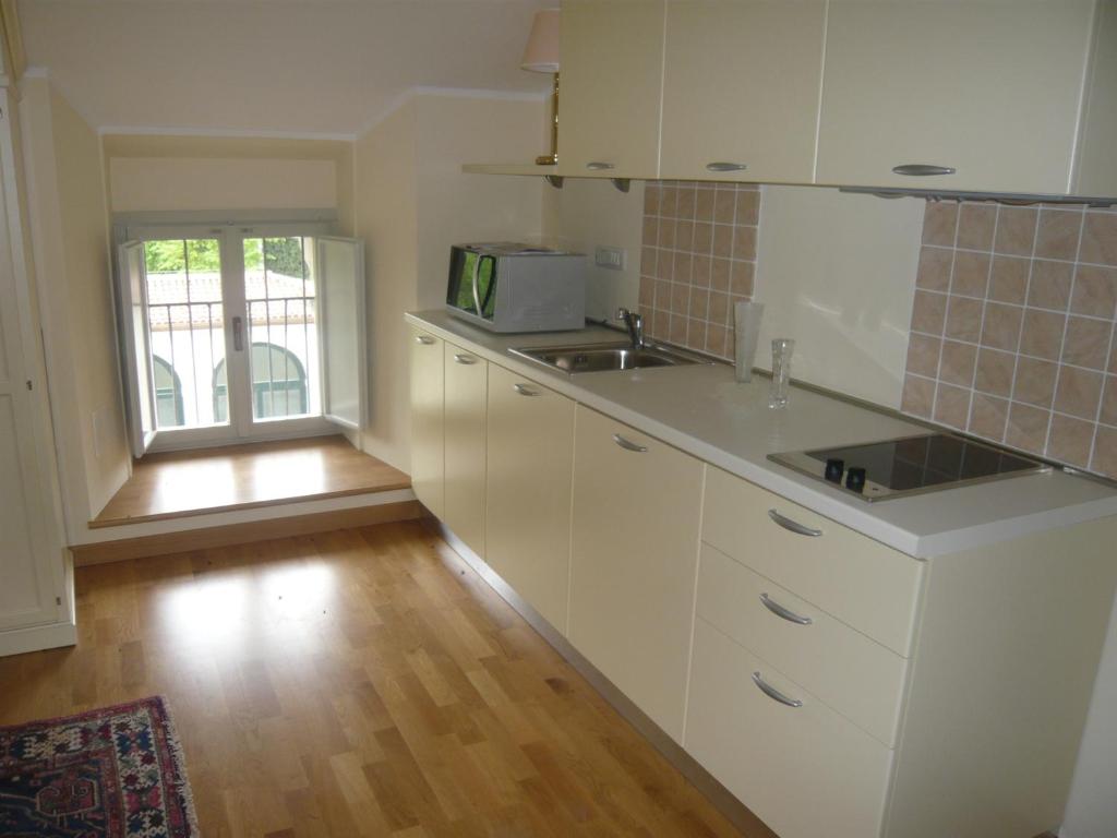 Kuchyň nebo kuchyňský kout v ubytování Relais Villa Selle