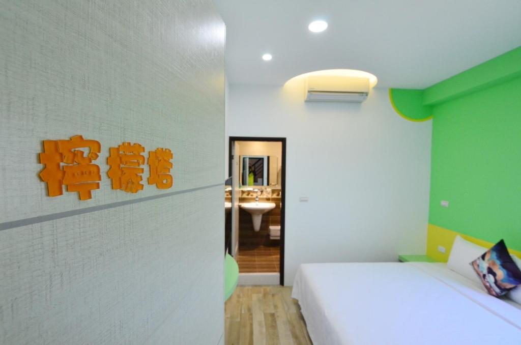Postel nebo postele na pokoji v ubytování Haipai Sweetheart Homestay