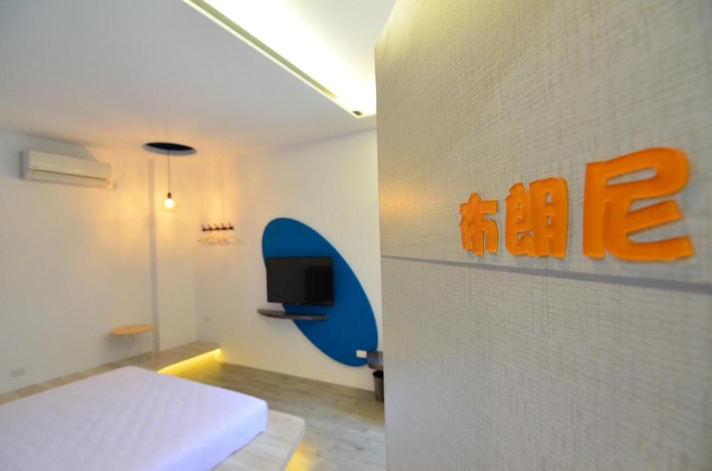 Postel nebo postele na pokoji v ubytování Haipai Sweetheart Homestay