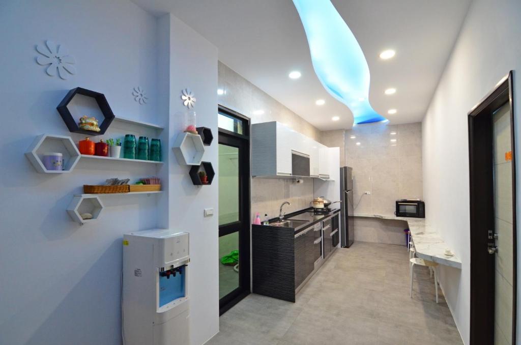 Kuchyň nebo kuchyňský kout v ubytování Haipai Sweetheart Homestay