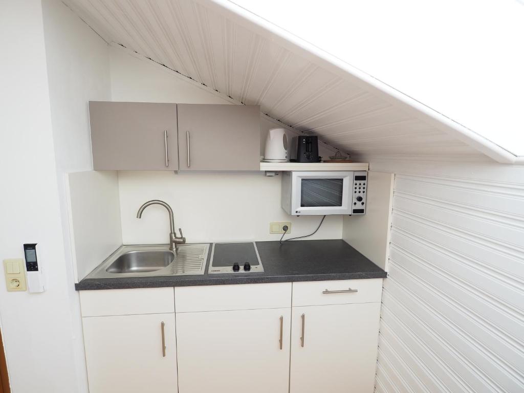 Kuchyňa alebo kuchynka v ubytovaní Appartements Peter