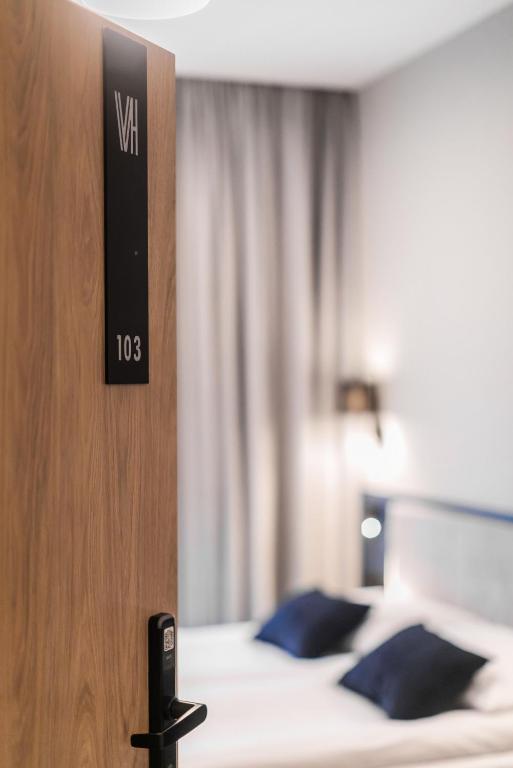 Postel nebo postele na pokoji v ubytování Hotel Vesper House