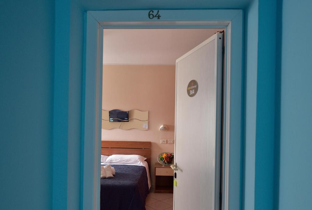 Postel nebo postele na pokoji v ubytování Hotel Oltremar B&B