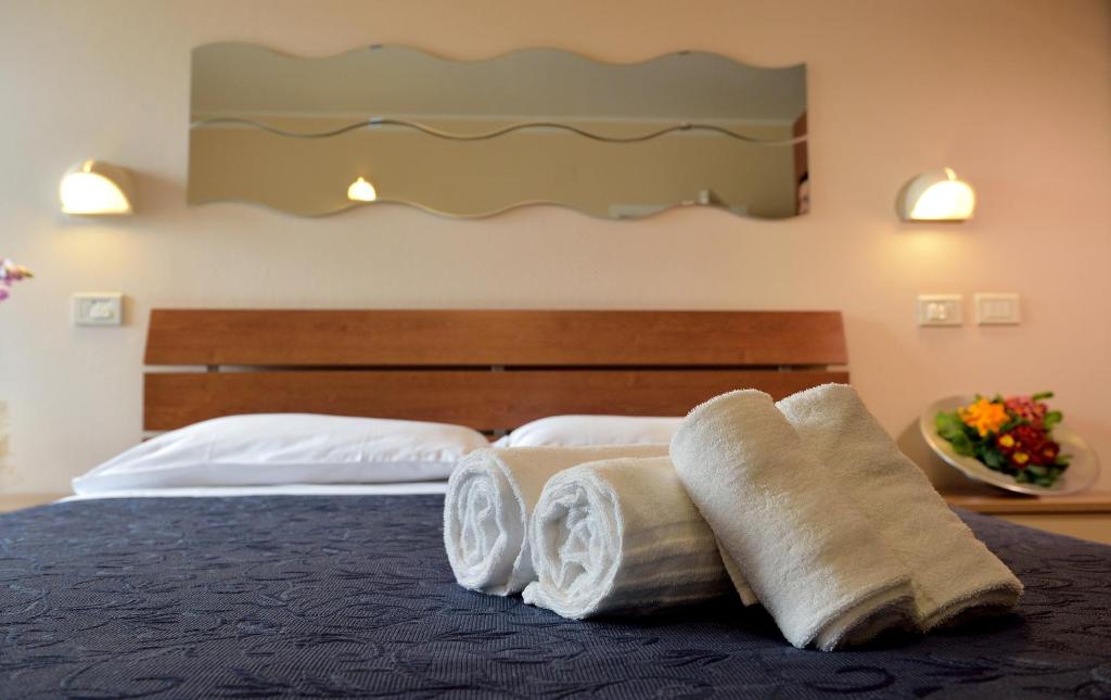 Postel nebo postele na pokoji v ubytování Hotel Oltremar B&B