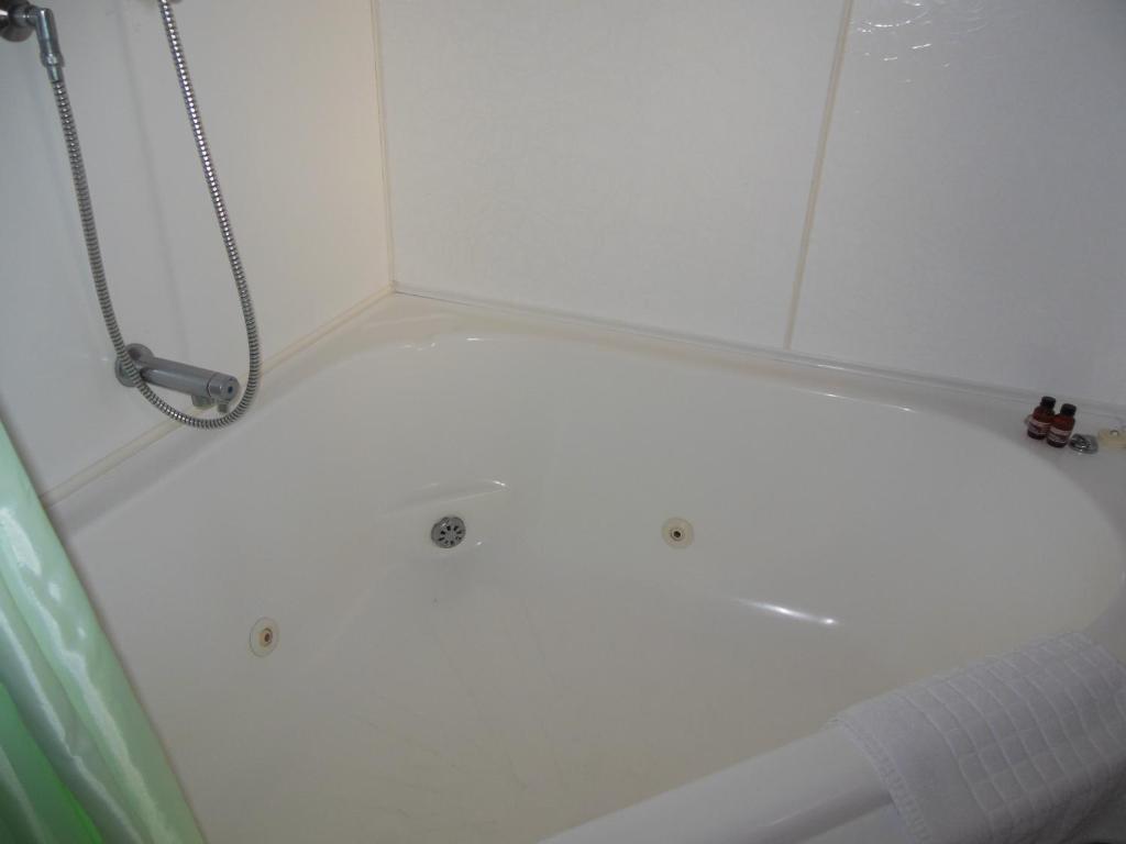 ASURE Camelot Arms Motor Lodge - Resim 17