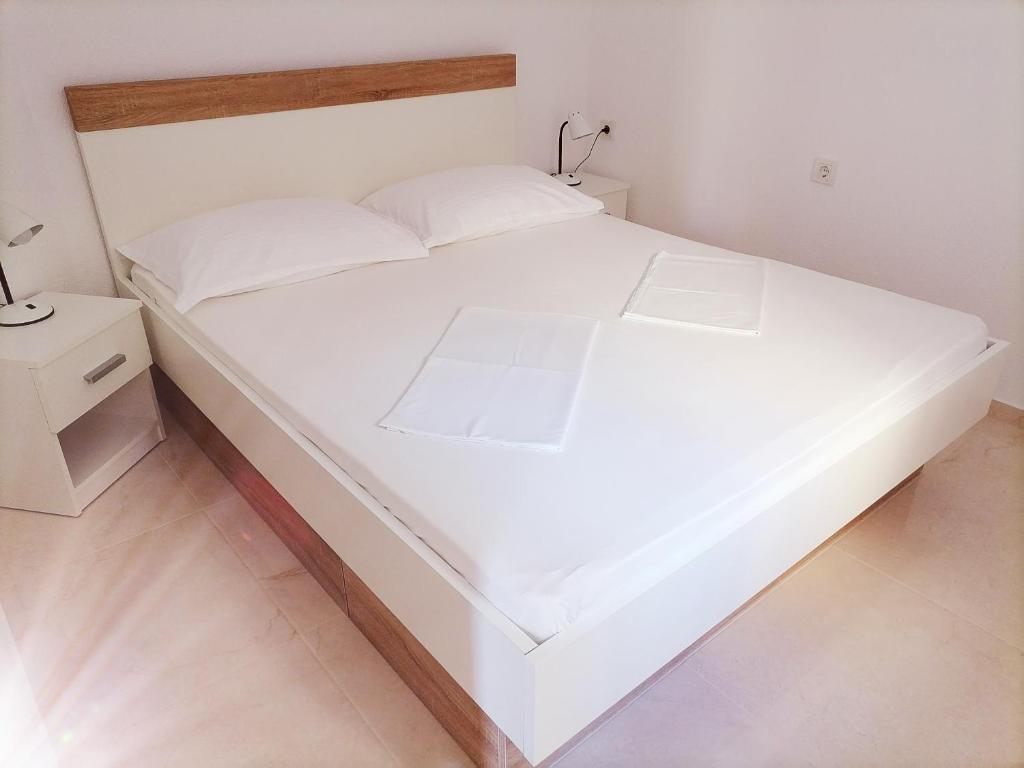 Postel nebo postele na pokoji v ubytování Bella Stivan