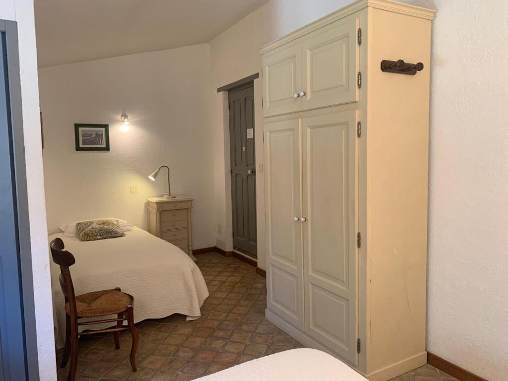 Postel nebo postele na pokoji v ubytování Bastide Sainte Agnès