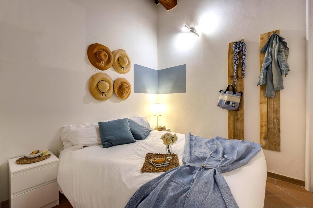 A bed or beds in a room at Vinegia N5 - Clemente & Settimo Apartments