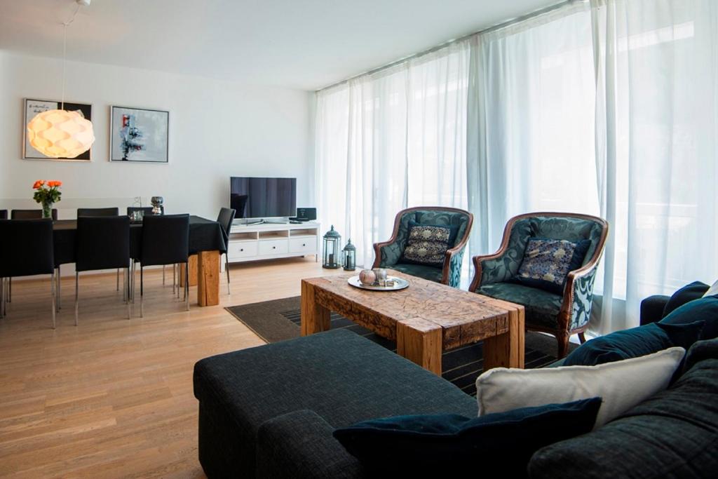 TV a/nebo společenská místnost v ubytování Haus Lothringen by AlpenTravel
