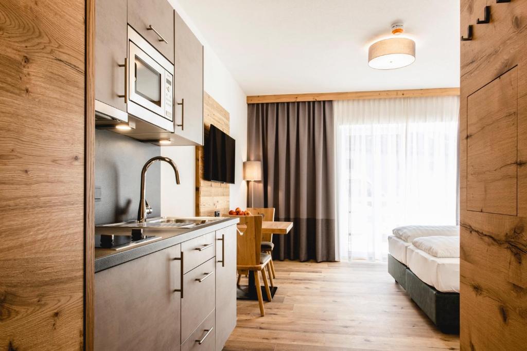 Kuchyň nebo kuchyňský kout v ubytování Kopeindlgut Apartments