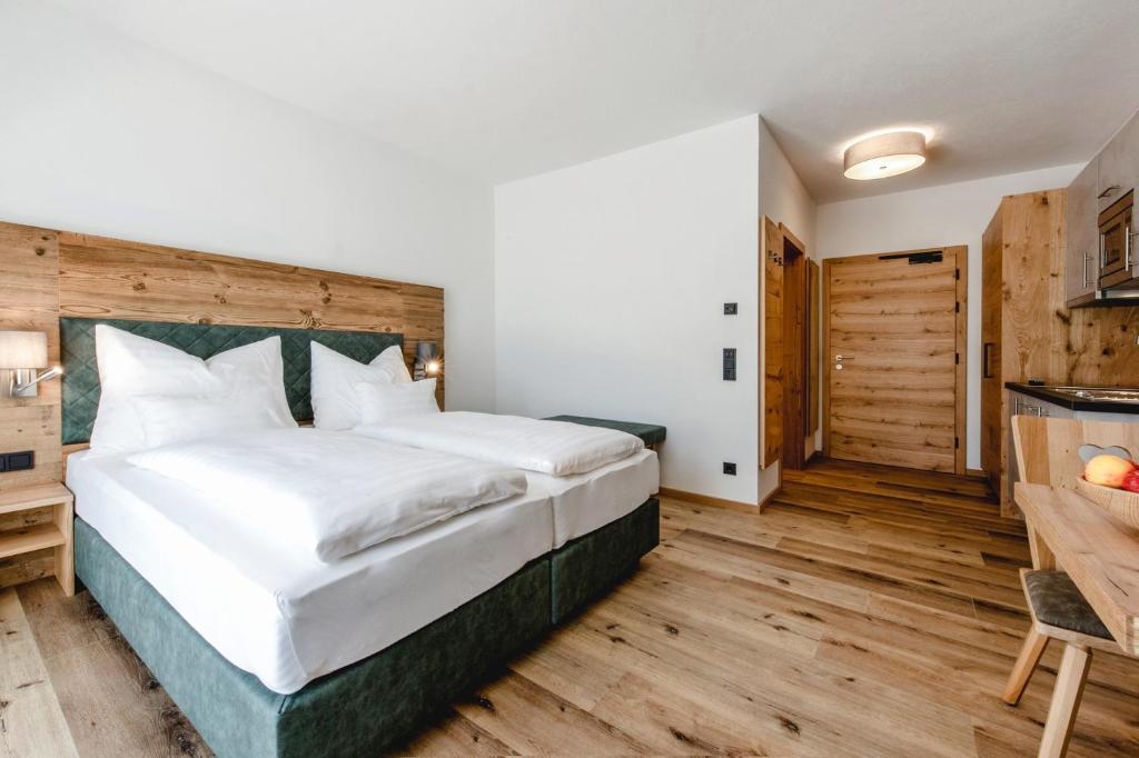 Postel nebo postele na pokoji v ubytování Kopeindlgut Apartments