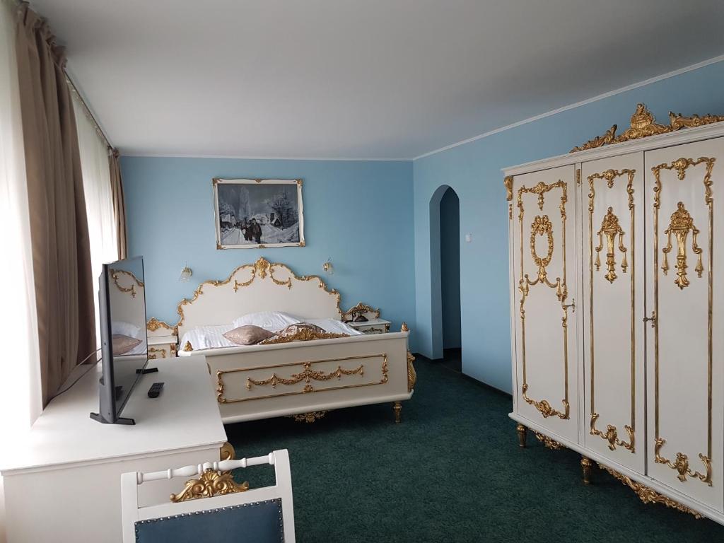Cama o camas de una habitación en Hotel Moldova