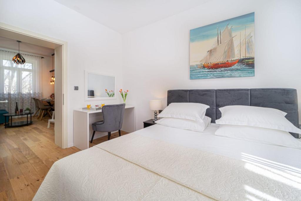 Posteľ alebo postele v izbe v ubytovaní Apartman Letifico