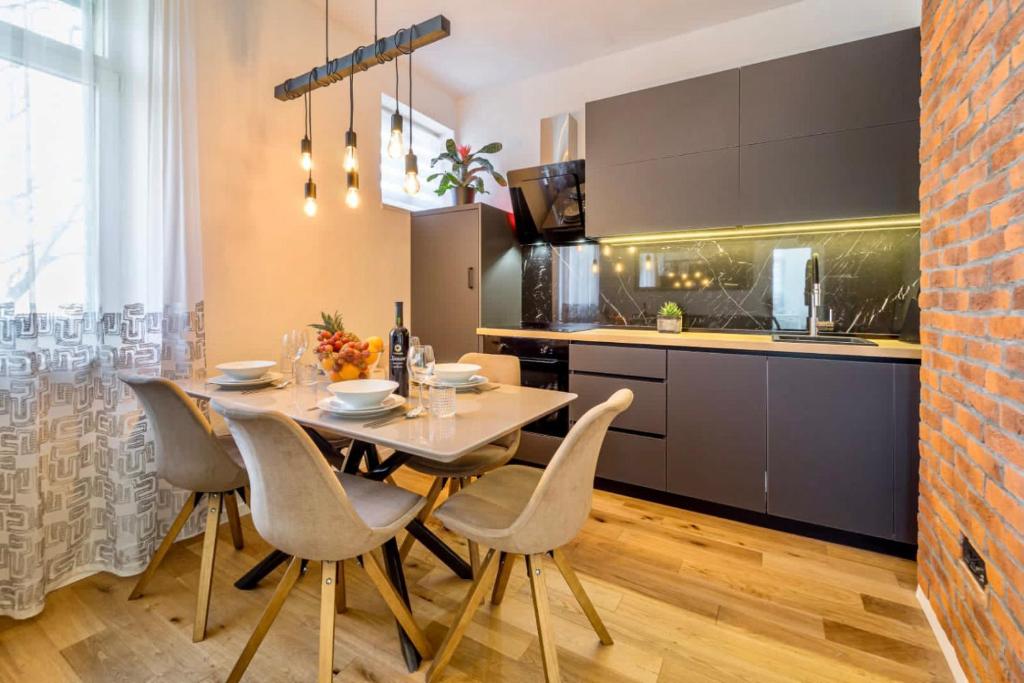 Kuchyňa alebo kuchynka v ubytovaní Apartman Letifico