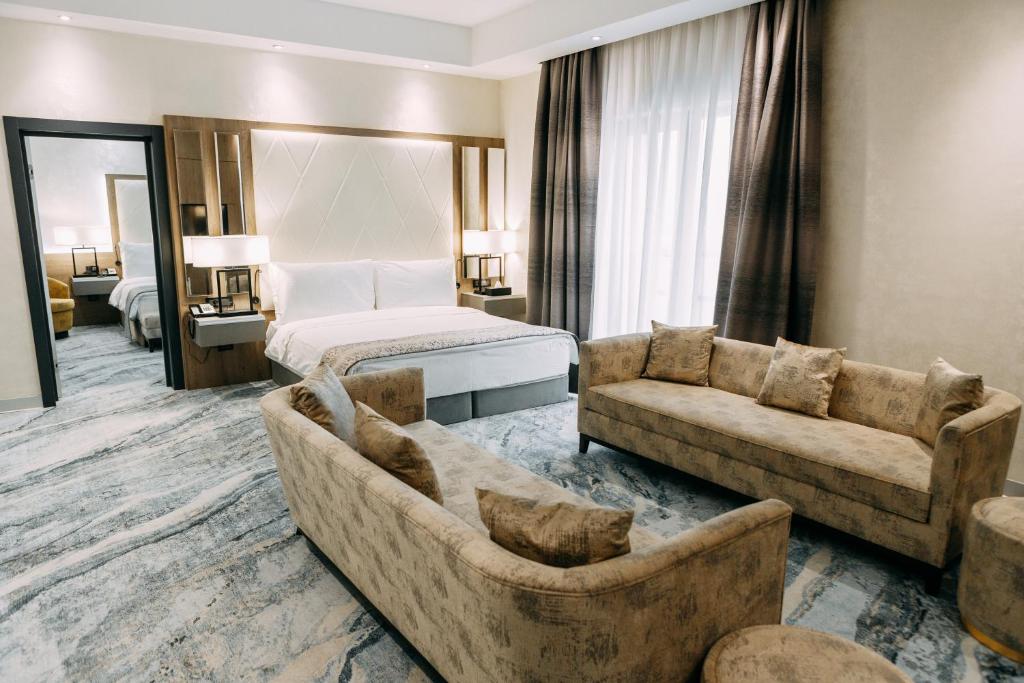 Postel nebo postele na pokoji v ubytování Rixos Turkistan