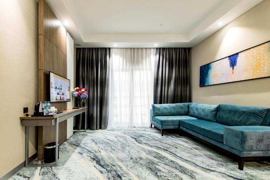 TV a/nebo společenská místnost v ubytování Rixos Turkistan