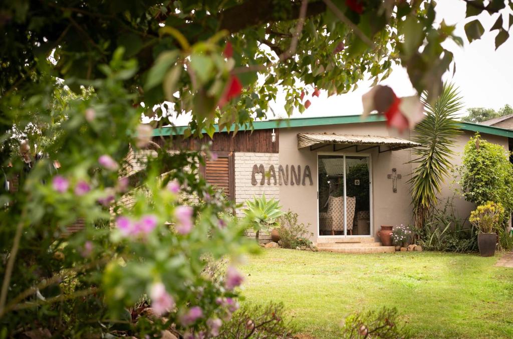 a house with the name gillian outside of it at Manna Self Catering Guesthouse in Graskop