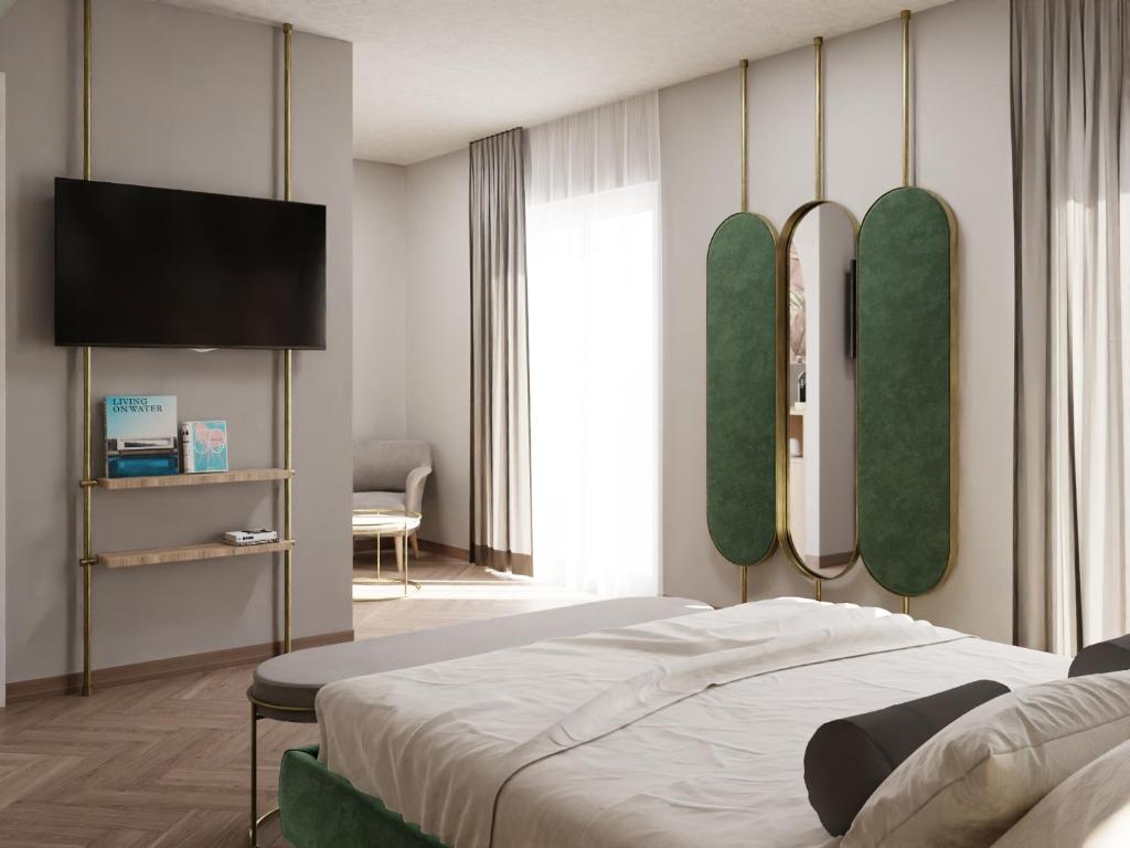 TV a/nebo společenská místnost v ubytování Salus Smart & Chic Hotel