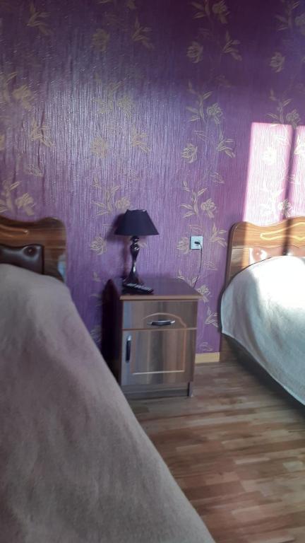 Llit o llits en una habitació de Chveni Ezo