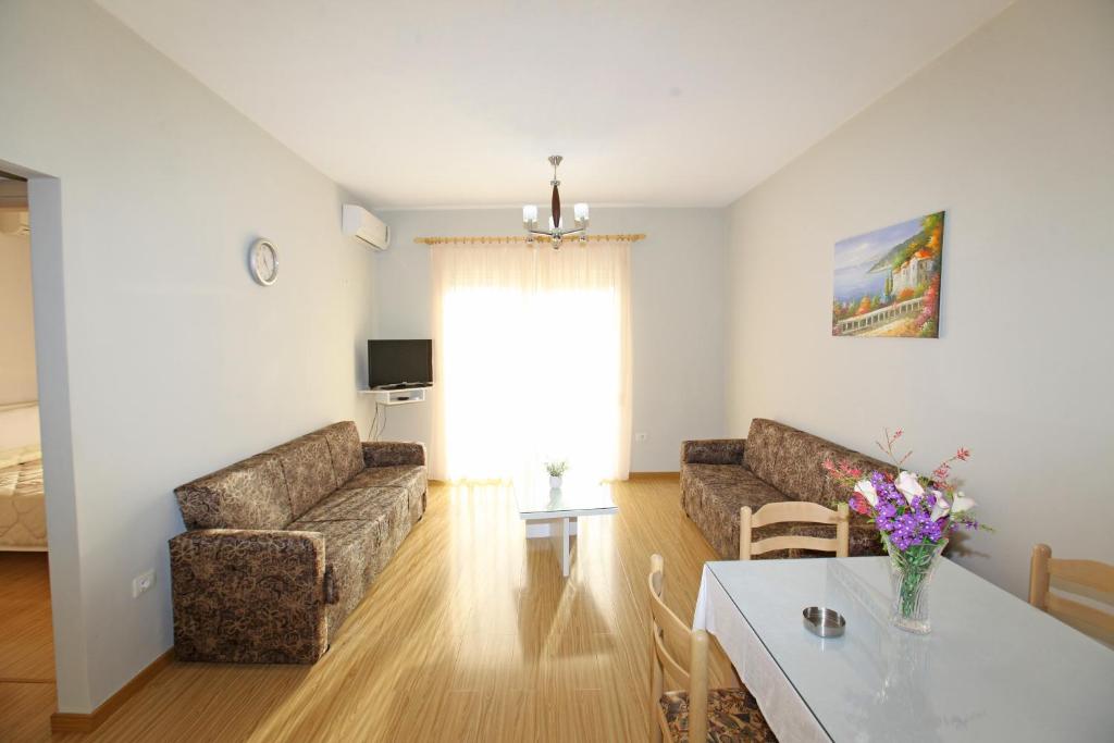 TV a/nebo společenská místnost v ubytování Teo Apartaments