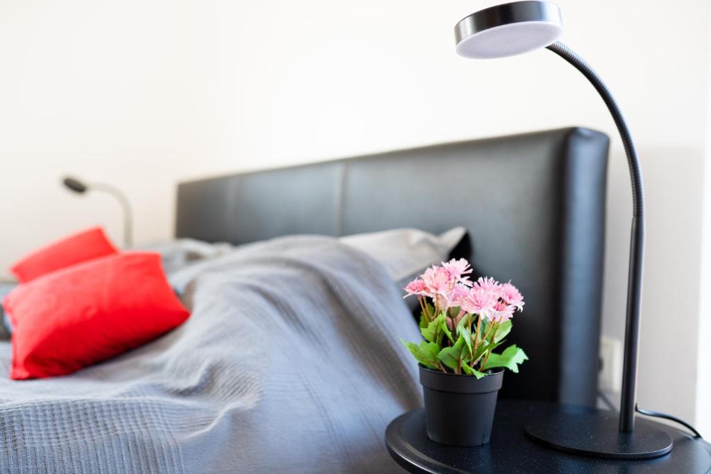 Posteľ alebo postele v izbe v ubytovaní SUPER PetrovA Apartment