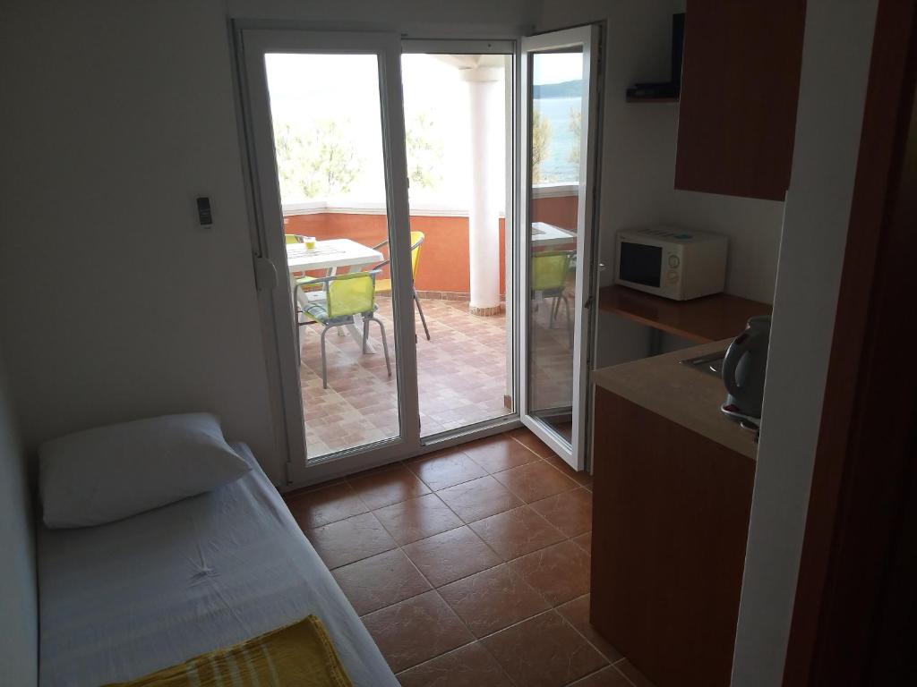 Kuchyňa alebo kuchynka v ubytovaní Apartments Bralic