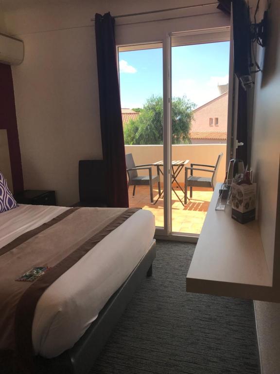 Balkón nebo terasa v ubytování Le Regina Hôtel et restaurant Canet-plage