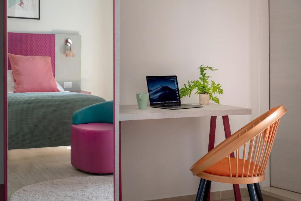 TV a/nebo společenská místnost v ubytování Hotel Rainbow ***S