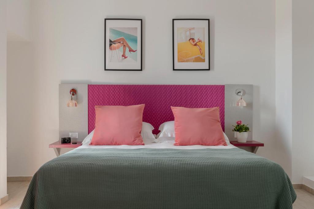 Postel nebo postele na pokoji v ubytování Hotel Rainbow ***S